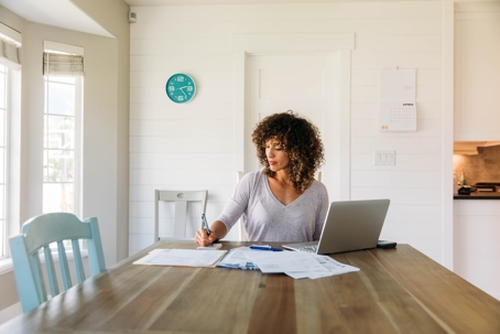 Woman looking over paperwork