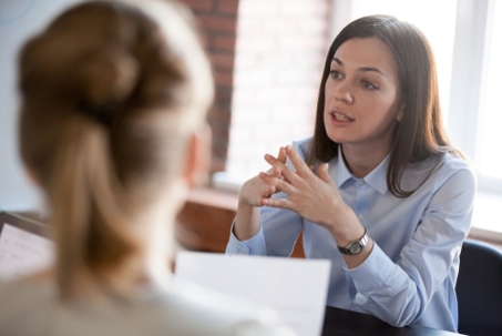 woman speaking in meeting